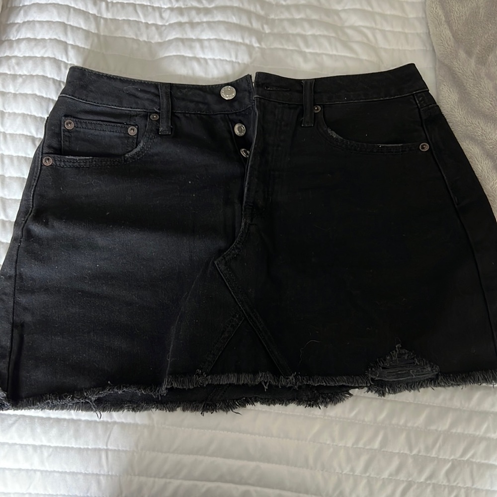 Black, button up mini skirt.